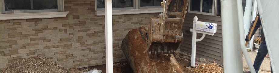 old oil tank being removed from residential property