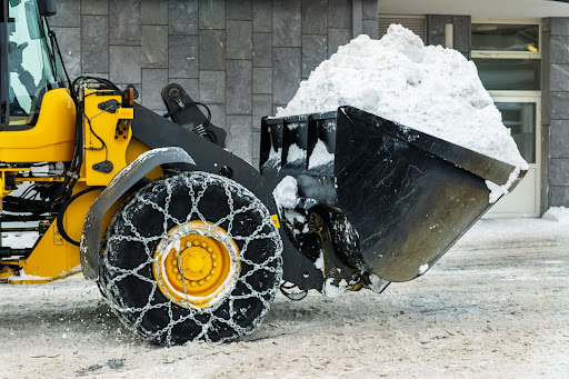 snow plow moving snow